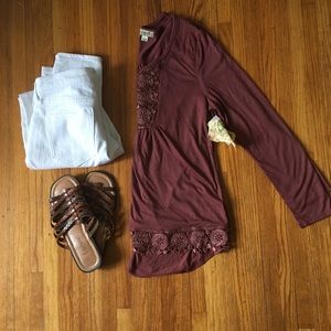 One World mauve top with pretty details. Size S.